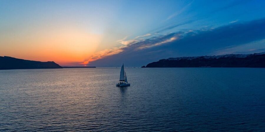 Santorini: Sunset Cruise with Swim Stops, Dinner, and Drinks - Red Beach Swim and Snorkel: How to Make the Water Time Count