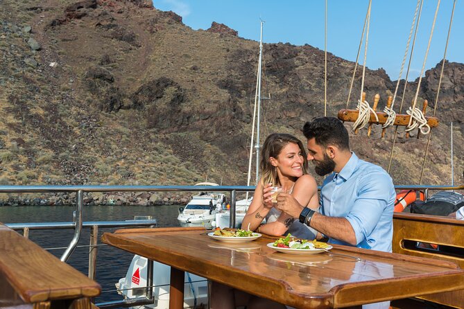 Santorini Sunset Dinner Cruise Including Nea Kameni Visit - The Boat Day Rhythm: Cruise, Volcano, Dinner, Sunset