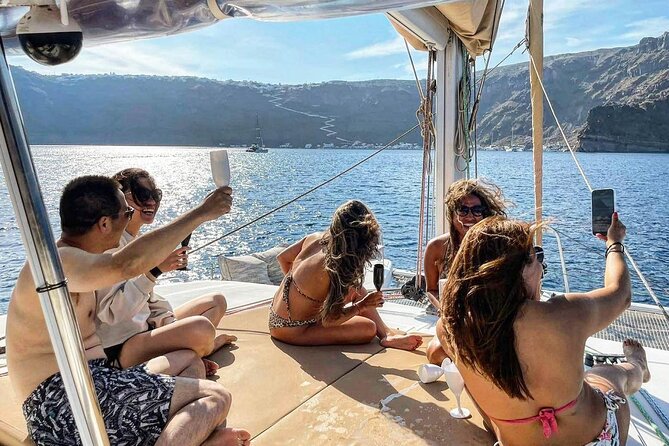 Santorini Sunset Sailing Cruise: Dinner, BBQ, Open Bar, Transfers - Red Beach Stop for Sightseeing and an Easy Swim