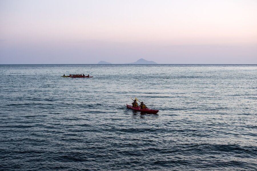Santorini: Sunset Sea Kayak with Light Dinner - Kampia Beach Break, Snack, and Swimming Time