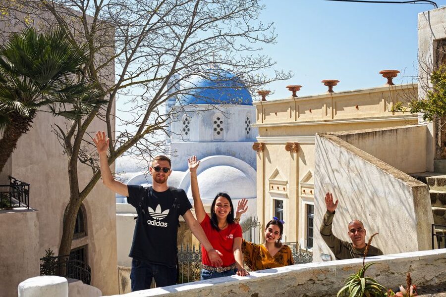 Santorini: Sunset Walking Tour with Local Food and Drinks - Firostefani Flavors: Ancient Seafood, Views, and the Virgin Mary Church Stop