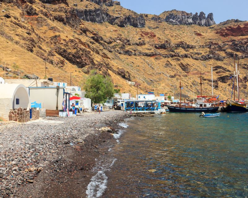 Santorini: Thirassia Islands and Volcano Guided Cruise - Boat day comfort: seating, shade, toilets, and seasickness reality