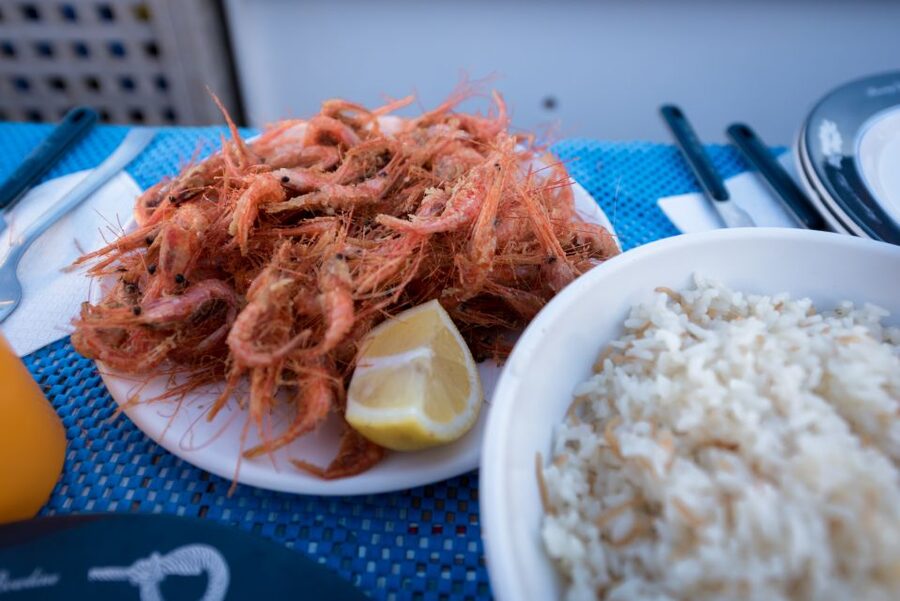 Santorini: Traditional Fishing Trip and Fresh Fish Lunch - Why Santorini From a Traditional Fishing Boat Beats the Usual Cruise