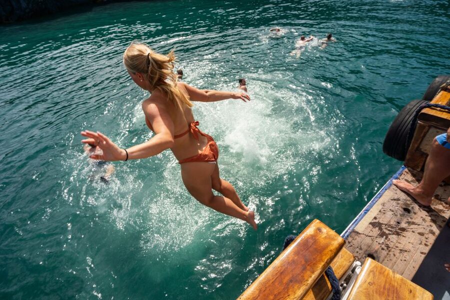 Santorini: Volcanic Islands Cruise with Hot Springs Visit - On Board: Wooden Boat, Commentary, and Real Time to Enjoy