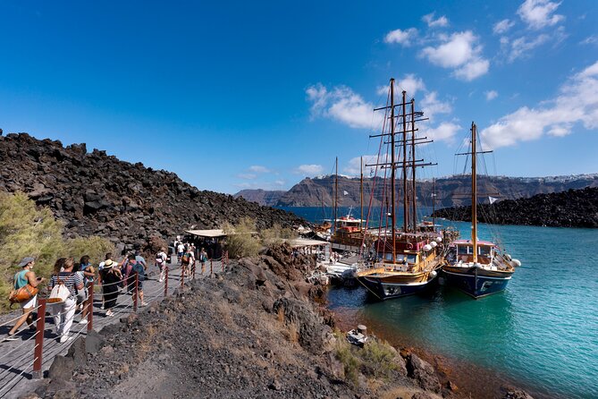 Santorini - Volcano and Hot springs Boat Trip with Bus Transfer - Getting to the Boat: Bus Transfer and Fira Old Port Flow