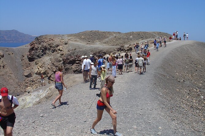 Santorini - Volcano and Hot springs Boat Trip with Bus Transfer - Stop 2: Palaia Kameni Hot Springs at St. Nicholas Bay (About 30m)