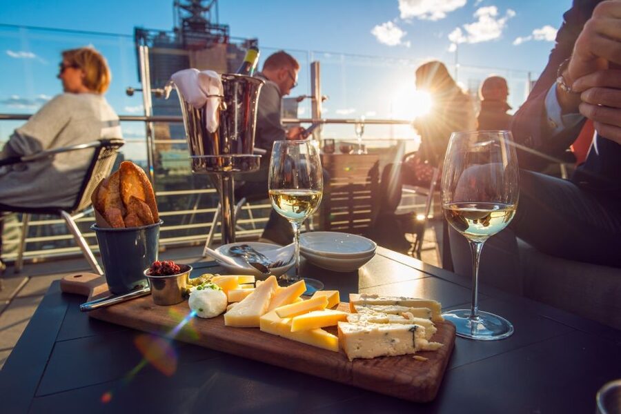 Santorini: Volcano and Hot Springs Sunset Dinner Cruise - Hotel pickup to Athinios Port: how the day actually flows