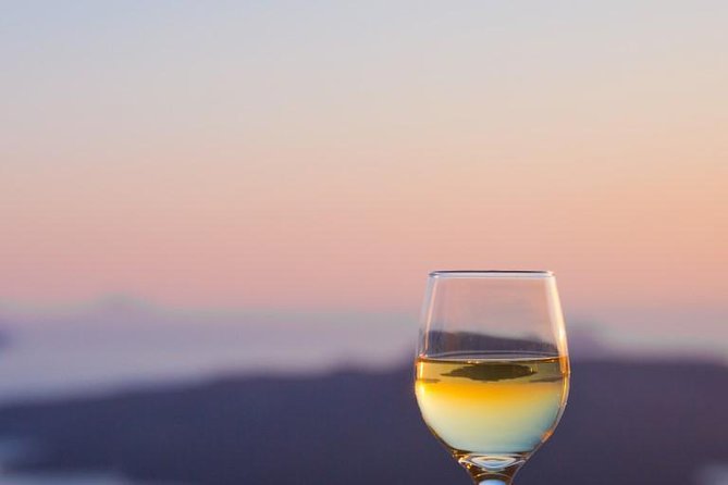 Santorini Wine Adventure with 12 Wine Tastings, Tapas and Sunset - Santo Wines in the middle: the tasting hub and the caldera energy