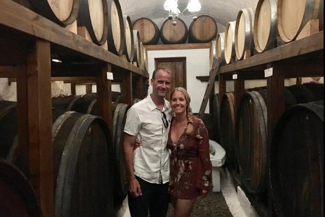 Santorini Wine Adventure with 12 Wine Tastings, Tapas and Sunset - Sunset upgrade at Santo Wines: terrace tables, full sunset timing, and photo moments