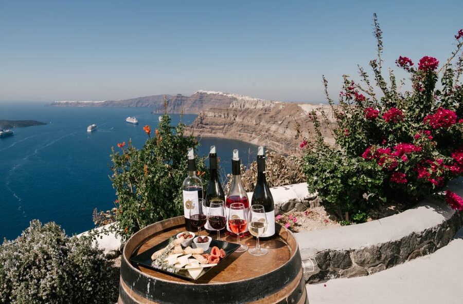 Santorini: Wine Tasting Tour to 3 Wineries with Transfer - Canava Roussos: the outdoor garden tasting that sets a relaxed tone