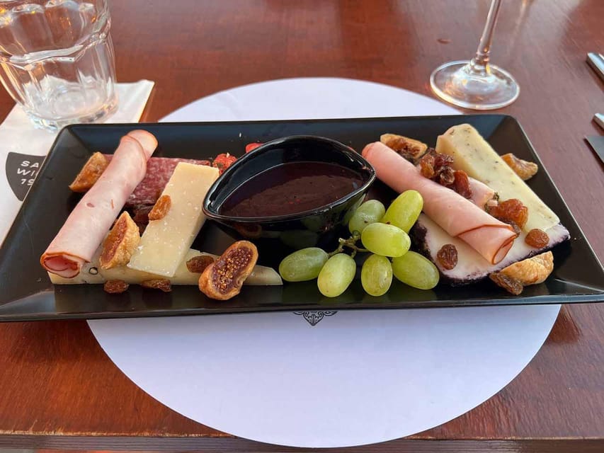 Santorini: Wine Tasting Tour with Snacks - Cheese and snacks: a real pairing, not filler food