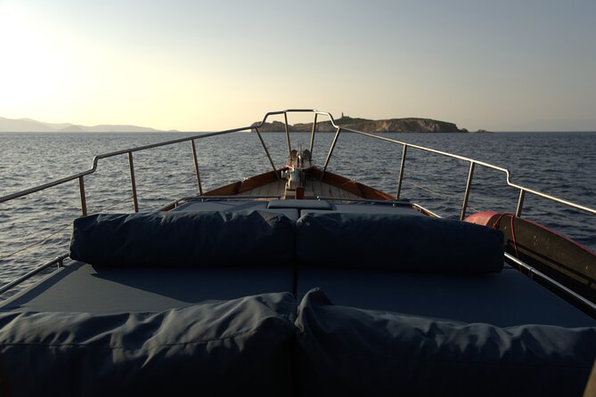 SemiPrivate Trip on 50ft Traditional Wooden Boat with Greek Lunch - Paralia Antrines on the West Side of Skopelos: Limestone Cliffs and SUP Options