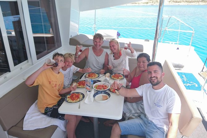 Shared Catamaran All inclusive-Day Cruise to Naxos or Paros - Snorkeling and swim stops where the water work is the point