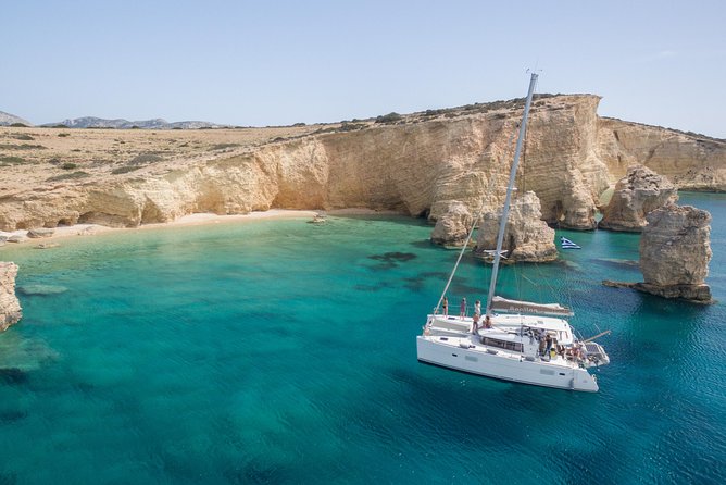 Shared Catamaran All inclusive-Day Cruise to Naxos or Paros - Crew style on the catamaran: friendly, safety-first, and in control