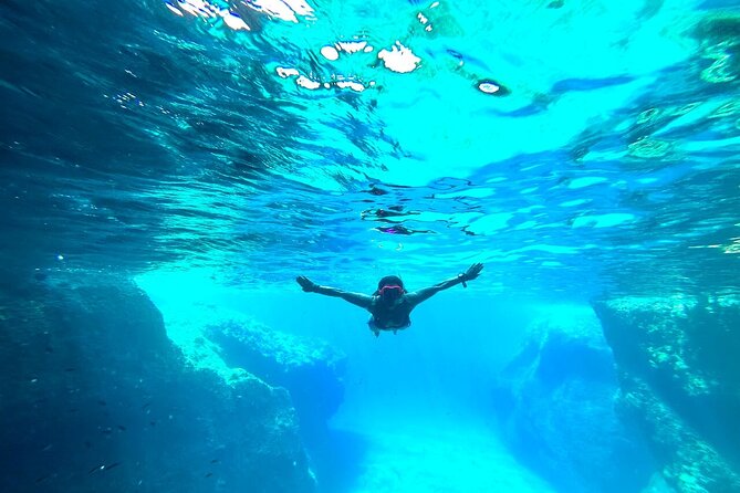 Small Group Kaiki Cruise & Greek Gastronomy Experience - Antiparos coast time: caves, coves, and sea-level views