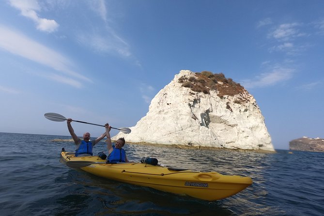 Small-Group Santorini Sea Caves Kayak Trip with Snorkeling & Picnic - White Beach Stop: Cliff Jumping and the First Big Hit of Fun