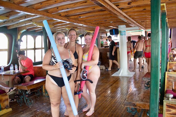 Sun & Sea 6 Hour All Inclusive Swimming Cruise with Greek BBQ & Unlimited Drinks - Swim Stop 3: Traganou Beach caves, 30 metres down and a tiny finish beach