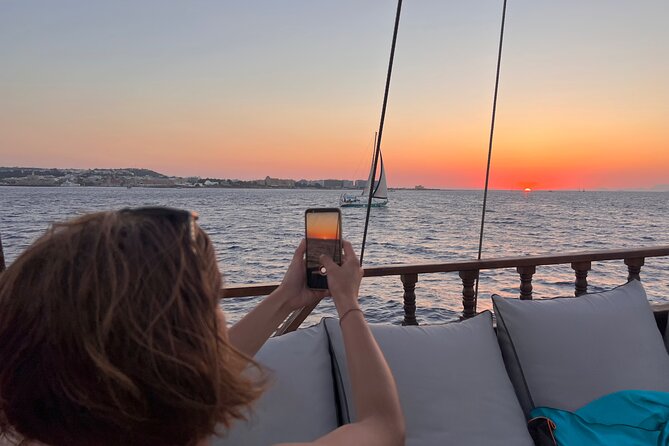 Sunset Cruise with Greek BBQ & Unlimited Aperol Spritz, Beer Wine - Passing old town walls, then heading for sunset light