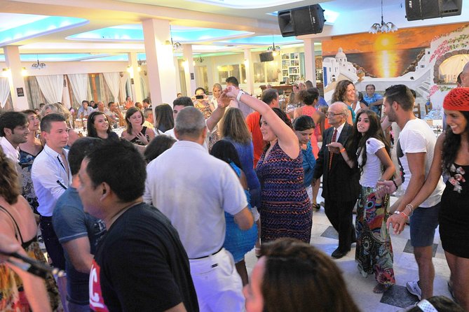 Traditional Greek Night live Music & Dinner Show in Santorini - Live music and dance show you can join, not just watch