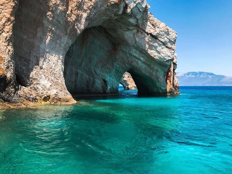 Zakynthos: Blue Caves and Navagio Bay Swim Cruise - Blue Caves, the 30-minute stop that defines the day