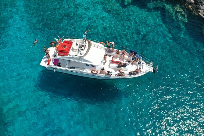Zakynthos boat tour:Shipwreck& Local blue caves with 3 Swim Stops - Blue Caves: Tight Passes, Close Views, and What to Expect