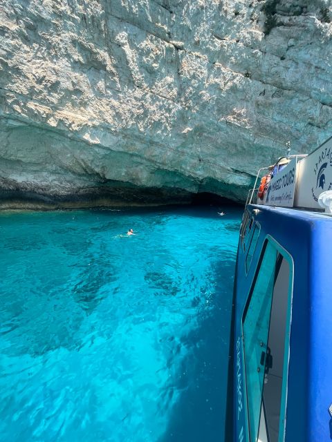 Zakynthos: Glass-Bottom Boat to Navagio, Caves & White Beach - White Beach and Sfogio Beach: the secluded swim, plus a fun rock-tower tradition