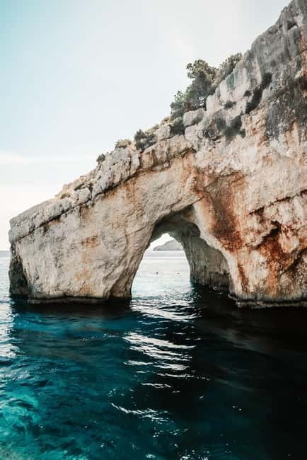 Zakynthos: Shipwreck, Blue Caves and Highlights Tour - Shipwreck Viewpoints, Panagiotis Boat Time, and Navagio Wreck Moments