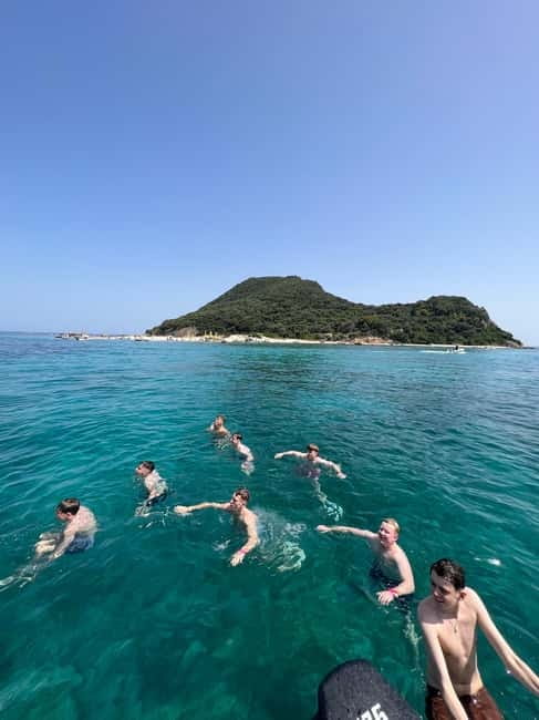 Zakynthos: Turtles, Marathonisi & Keri Caves Speedboat Tour - First Swim Break at the OASIS Beach: Warm Water, Rocky Edges
