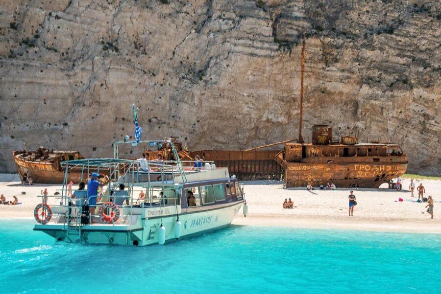 Zante: Half-Day Tour to Navagio, Blue Caves & White Beach - The 2,000-year-old olive tree stop: a landmark and a break